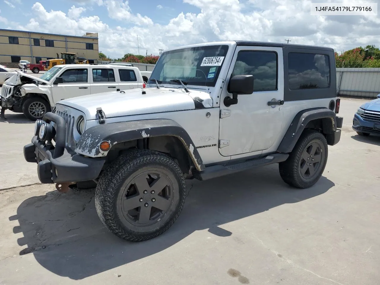 2009 Jeep Wrangler Sahara VIN: 1J4FA54179L779166 Lot: 62806754