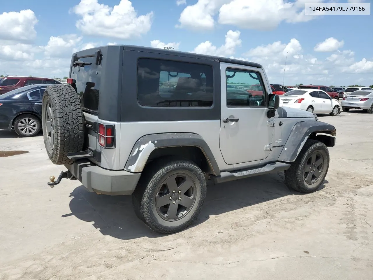 2009 Jeep Wrangler Sahara VIN: 1J4FA54179L779166 Lot: 62806754