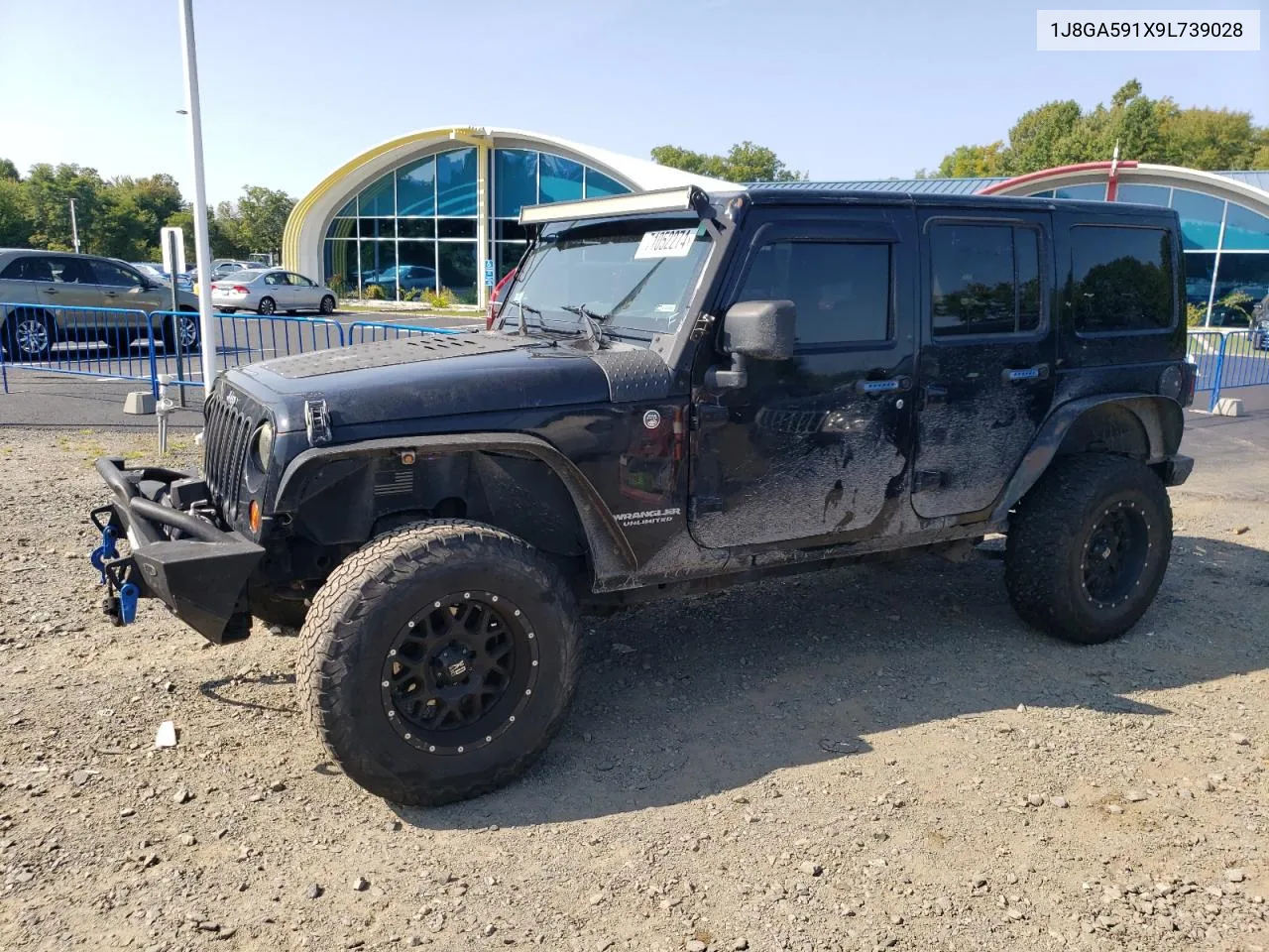 2009 Jeep Wrangler Unlimited Sahara VIN: 1J8GA591X9L739028 Lot: 71052274