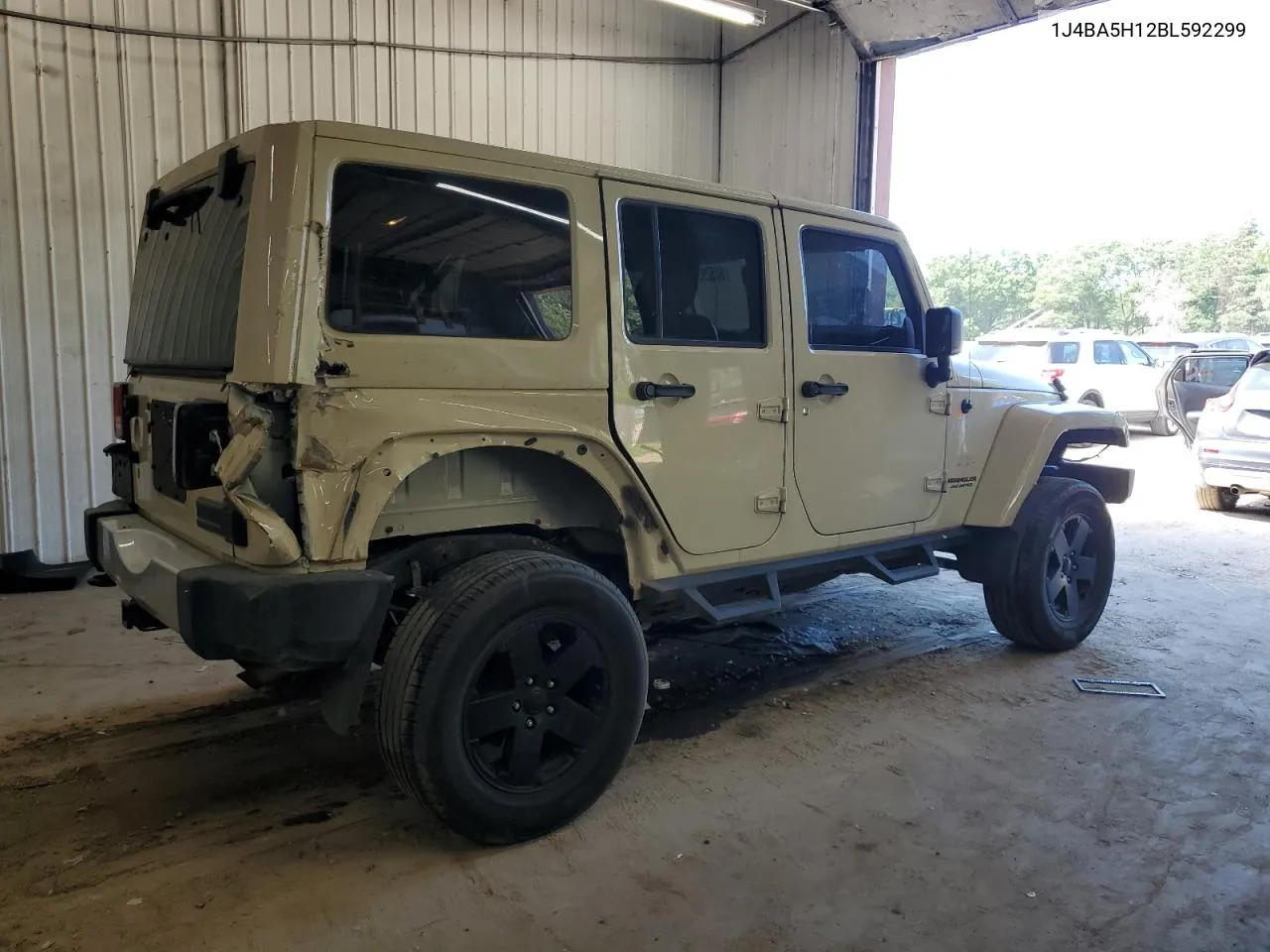 1J4BA5H12BL592299 2011 Jeep Wrangler Unlimited Sahara