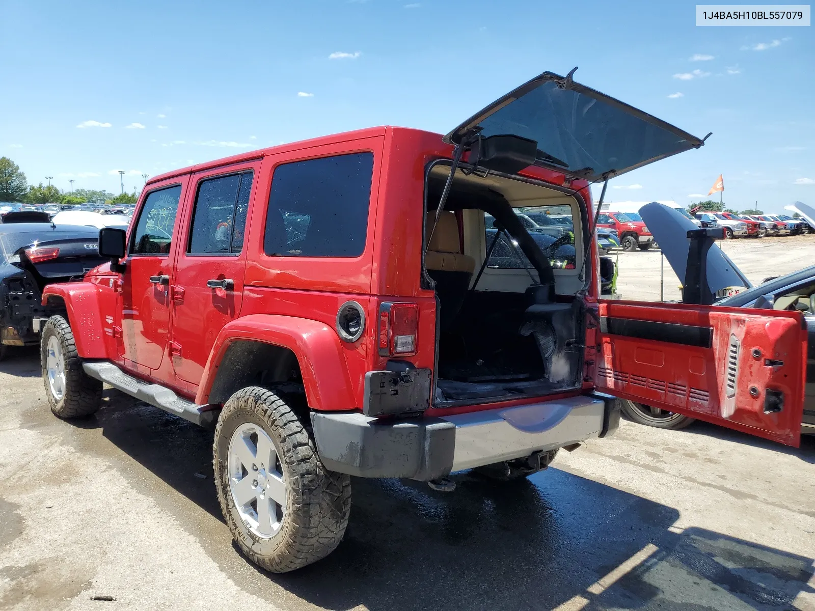 2011 Jeep Wrangler Unlimited Sahara VIN: 1J4BA5H10BL557079 Lot: 60683304