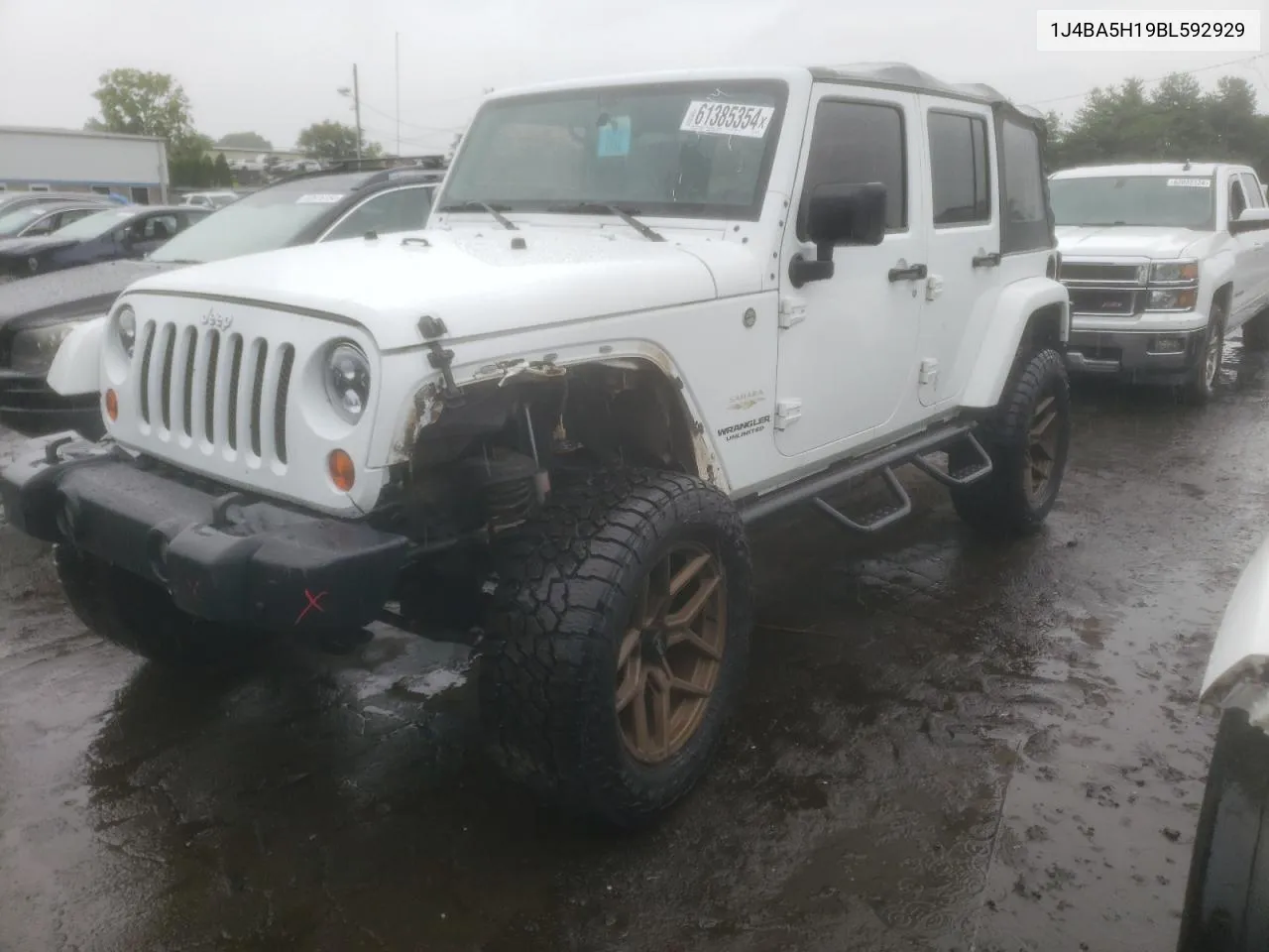 2011 Jeep Wrangler Unlimited Sahara VIN: 1J4BA5H19BL592929 Lot: 61385354