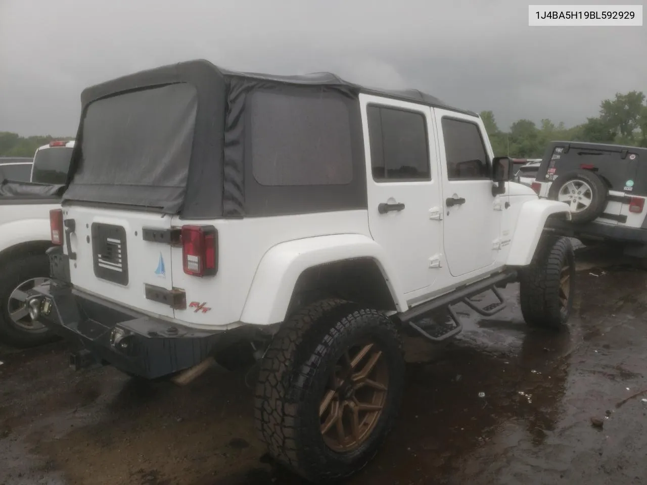 2011 Jeep Wrangler Unlimited Sahara VIN: 1J4BA5H19BL592929 Lot: 61385354