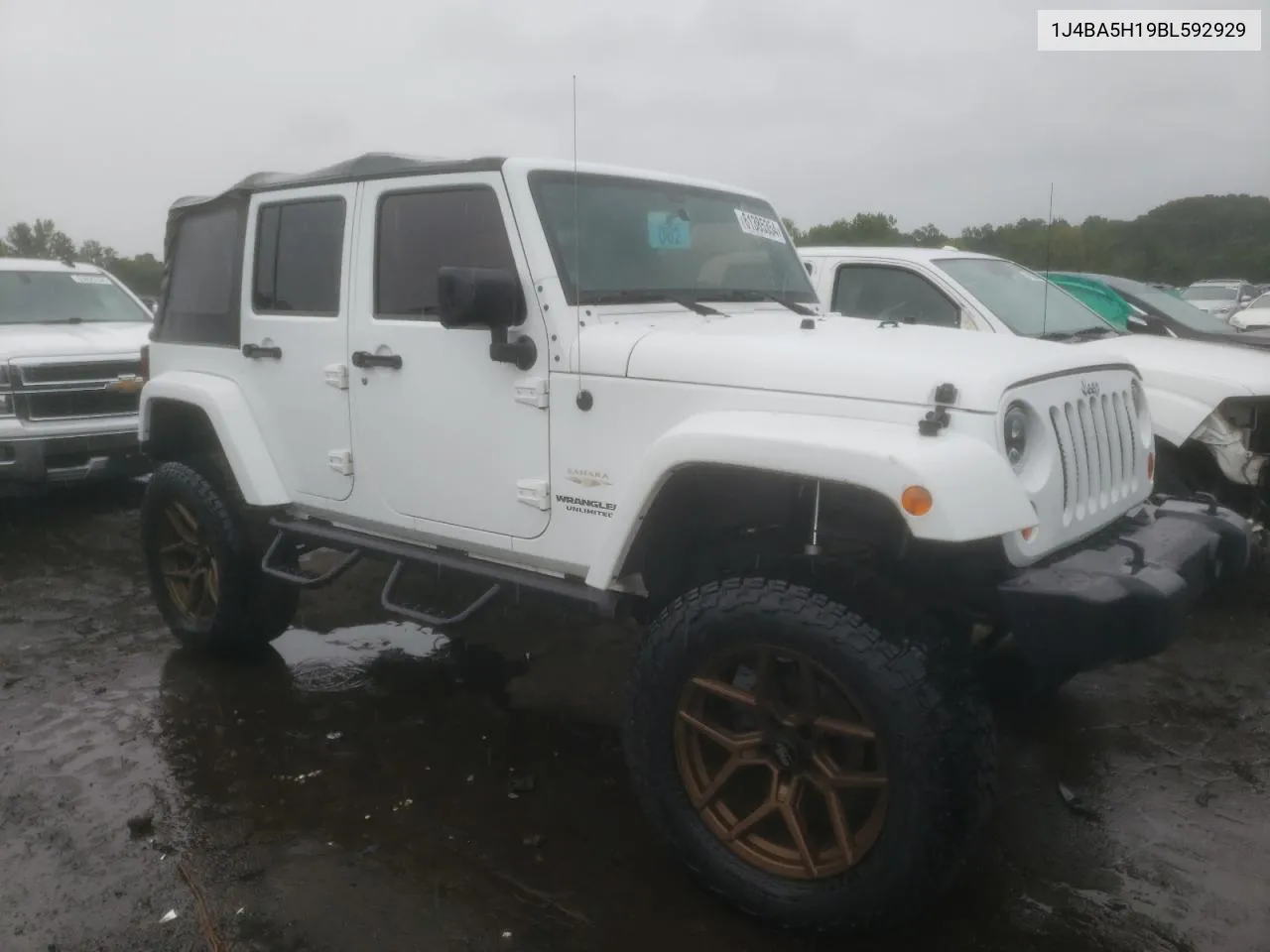 2011 Jeep Wrangler Unlimited Sahara VIN: 1J4BA5H19BL592929 Lot: 61385354