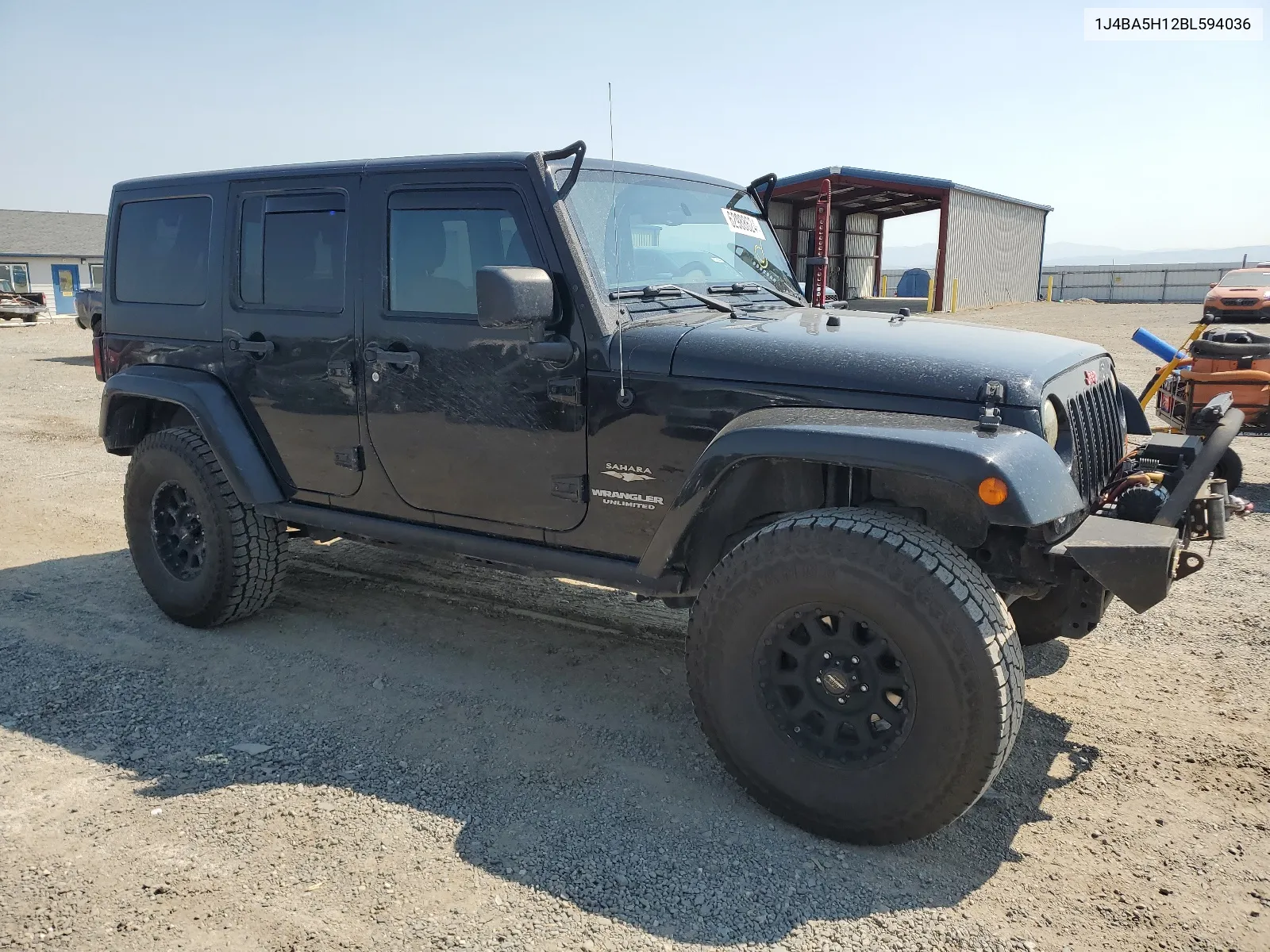 2011 Jeep Wrangler Unlimited Sahara VIN: 1J4BA5H12BL594036 Lot: 62988624