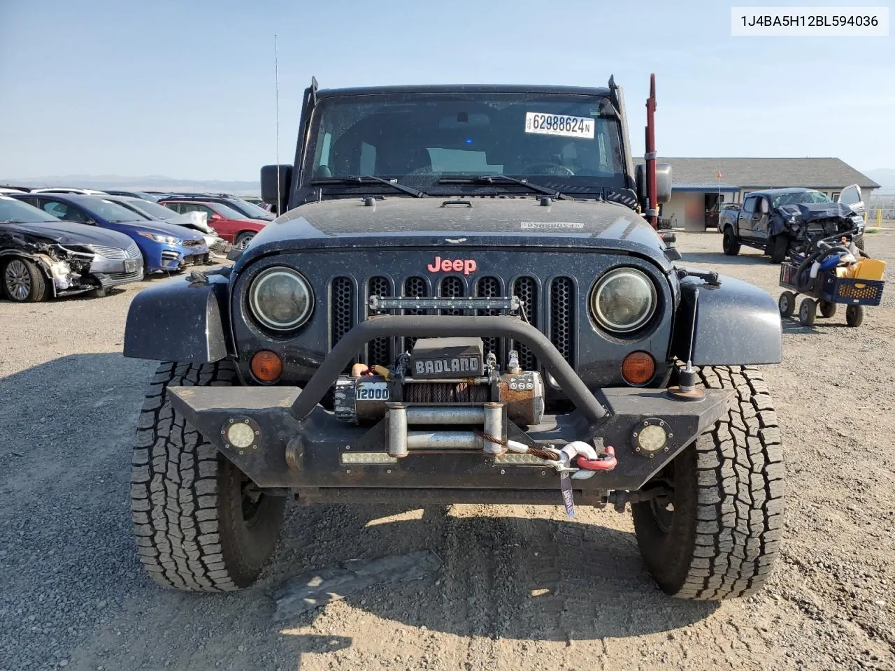 2011 Jeep Wrangler Unlimited Sahara VIN: 1J4BA5H12BL594036 Lot: 62988624