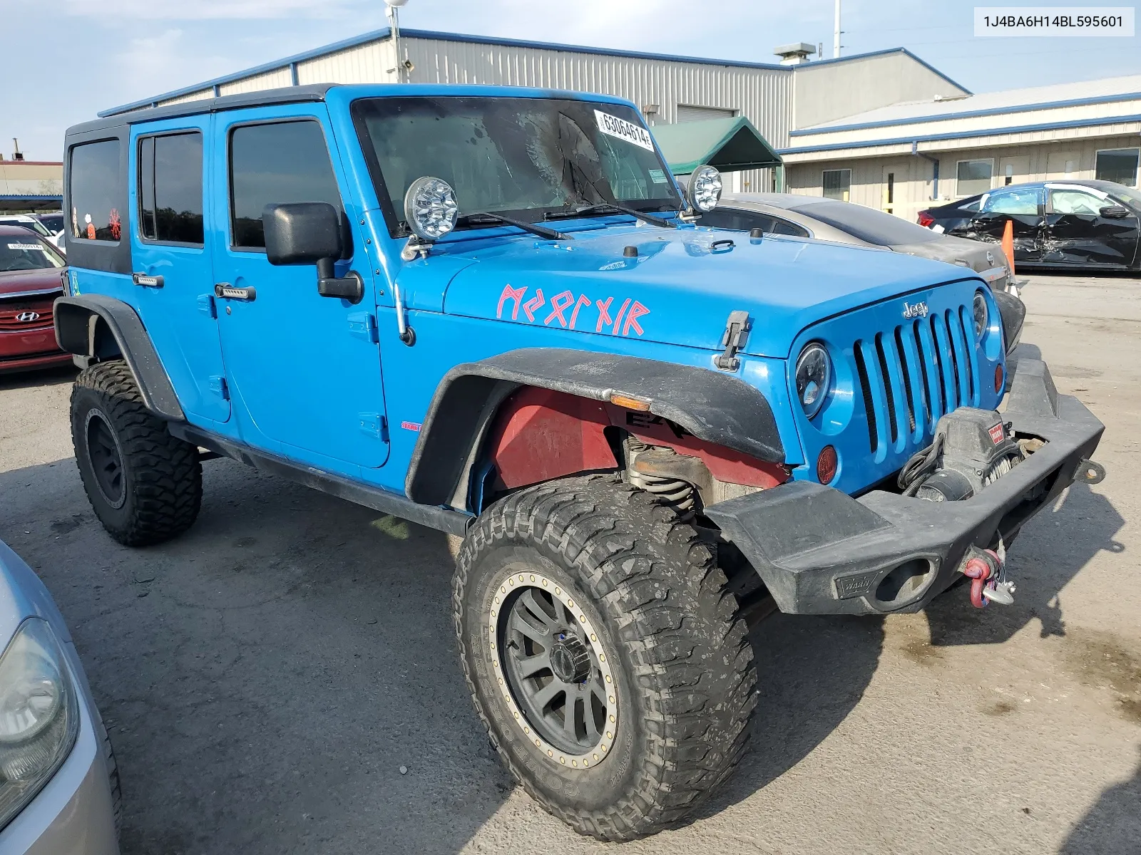 2011 Jeep Wrangler Unlimited Rubicon VIN: 1J4BA6H14BL595601 Lot: 63064614