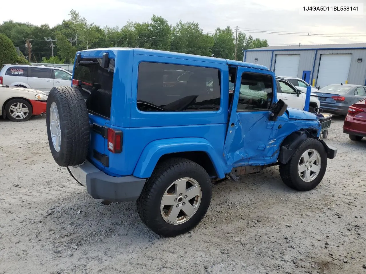 2011 Jeep Wrangler Sahara VIN: 1J4GA5D11BL558141 Lot: 63183134