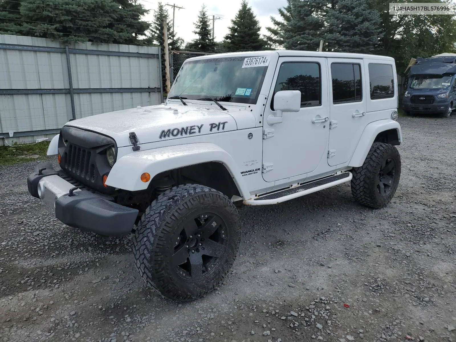 2011 Jeep Wrangler Unlimited Sahara VIN: 1J4HA5H17BL576996 Lot: 63876174