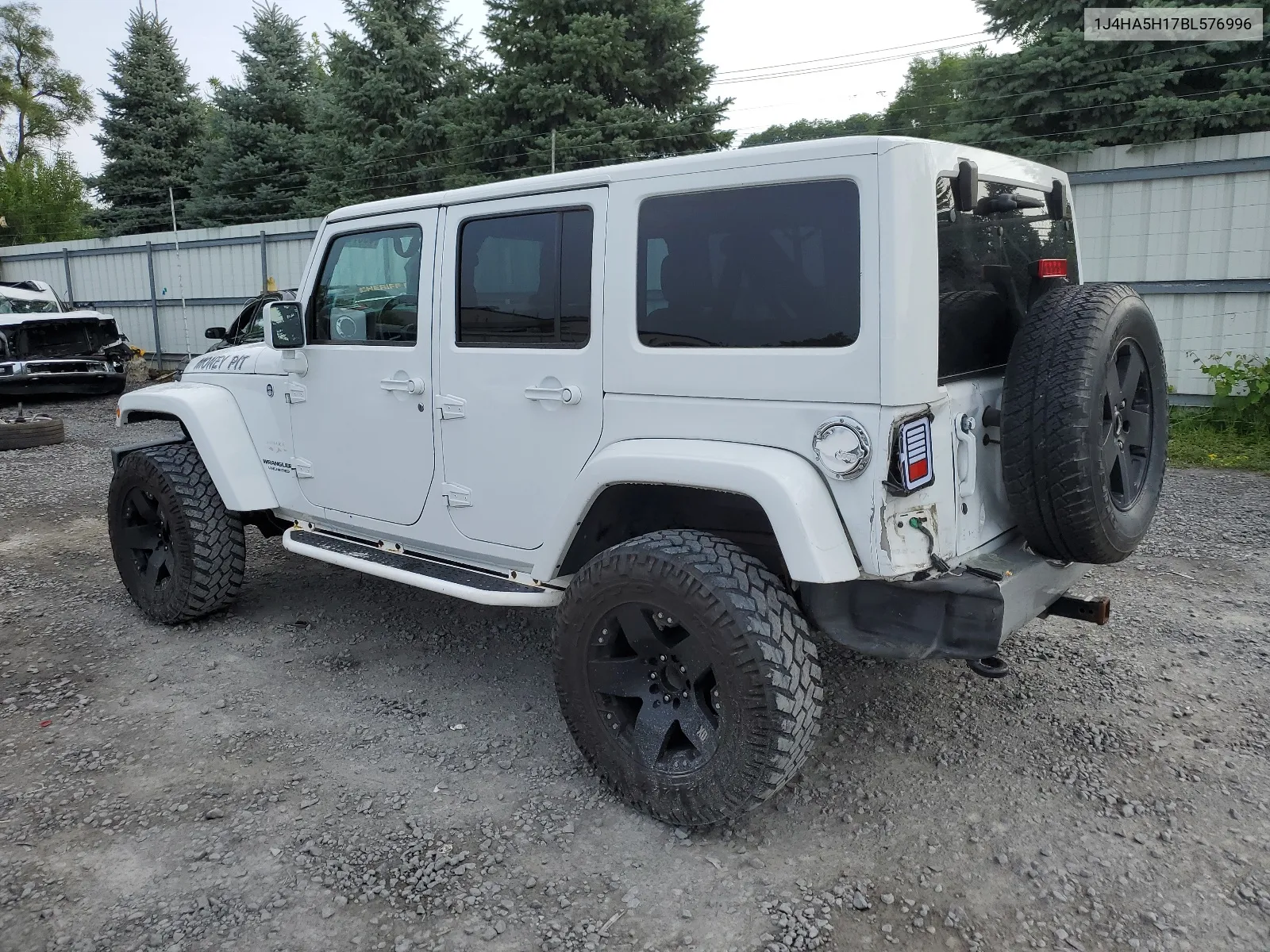 2011 Jeep Wrangler Unlimited Sahara VIN: 1J4HA5H17BL576996 Lot: 63876174