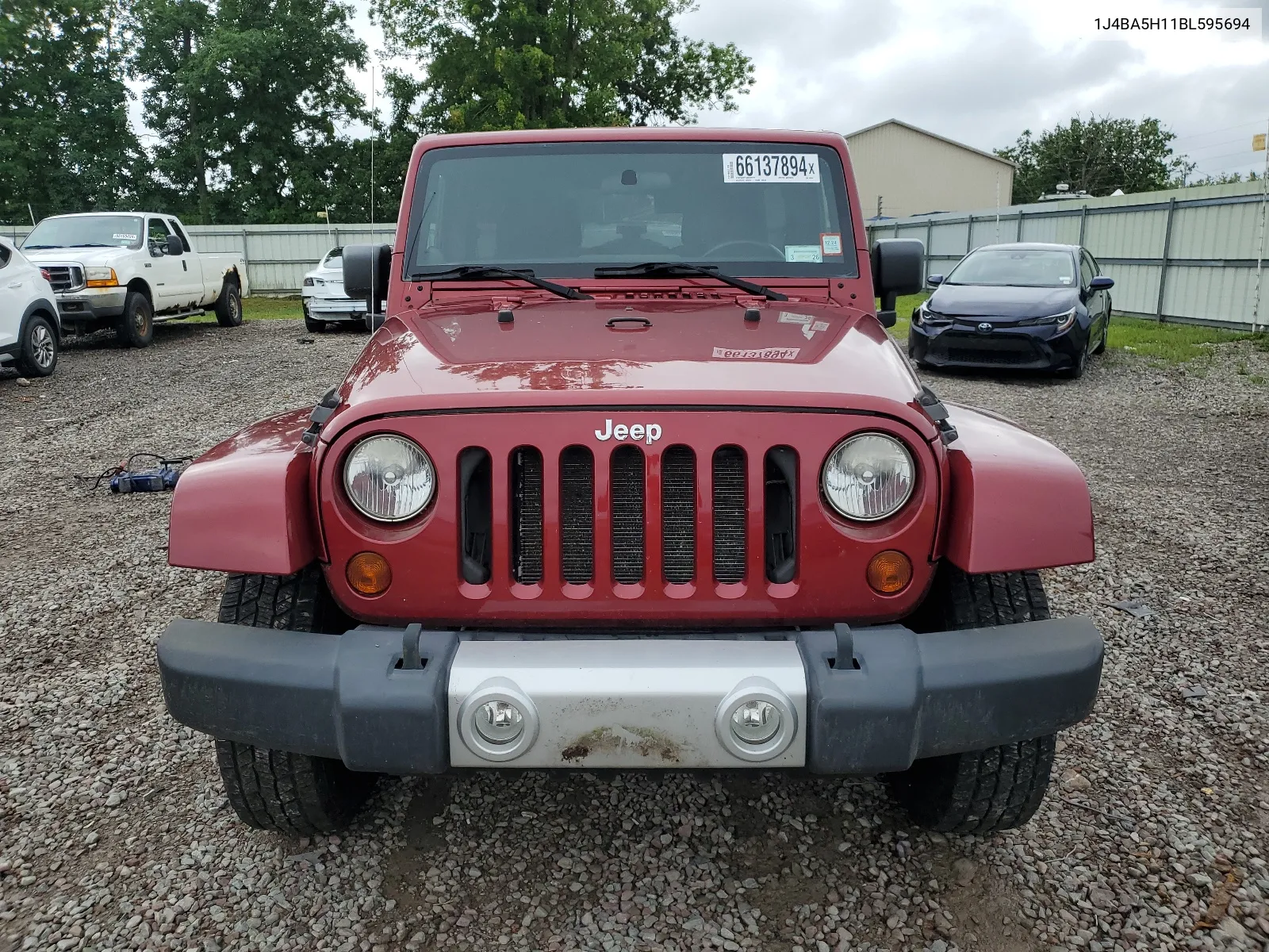 2011 Jeep Wrangler Unlimited Sahara VIN: 1J4BA5H11BL595694 Lot: 66137894