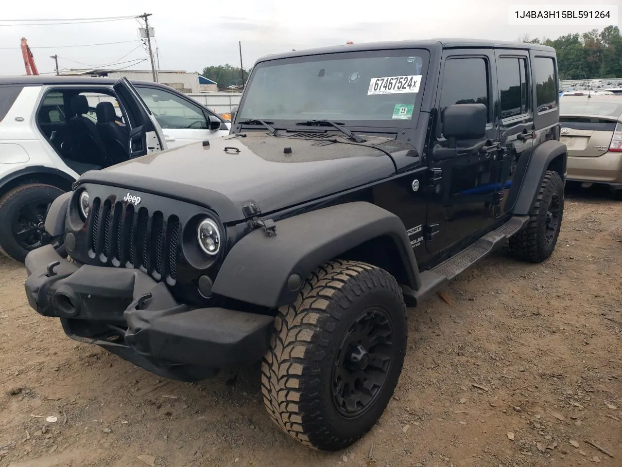 2011 Jeep Wrangler Unlimited Sport VIN: 1J4BA3H15BL591264 Lot: 67467524