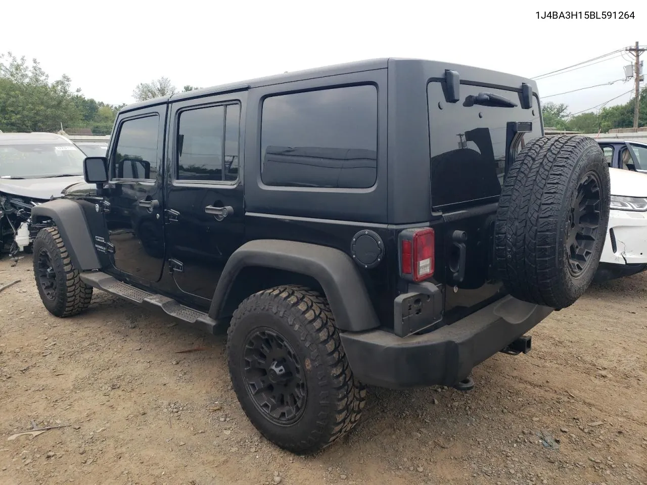 2011 Jeep Wrangler Unlimited Sport VIN: 1J4BA3H15BL591264 Lot: 67467524