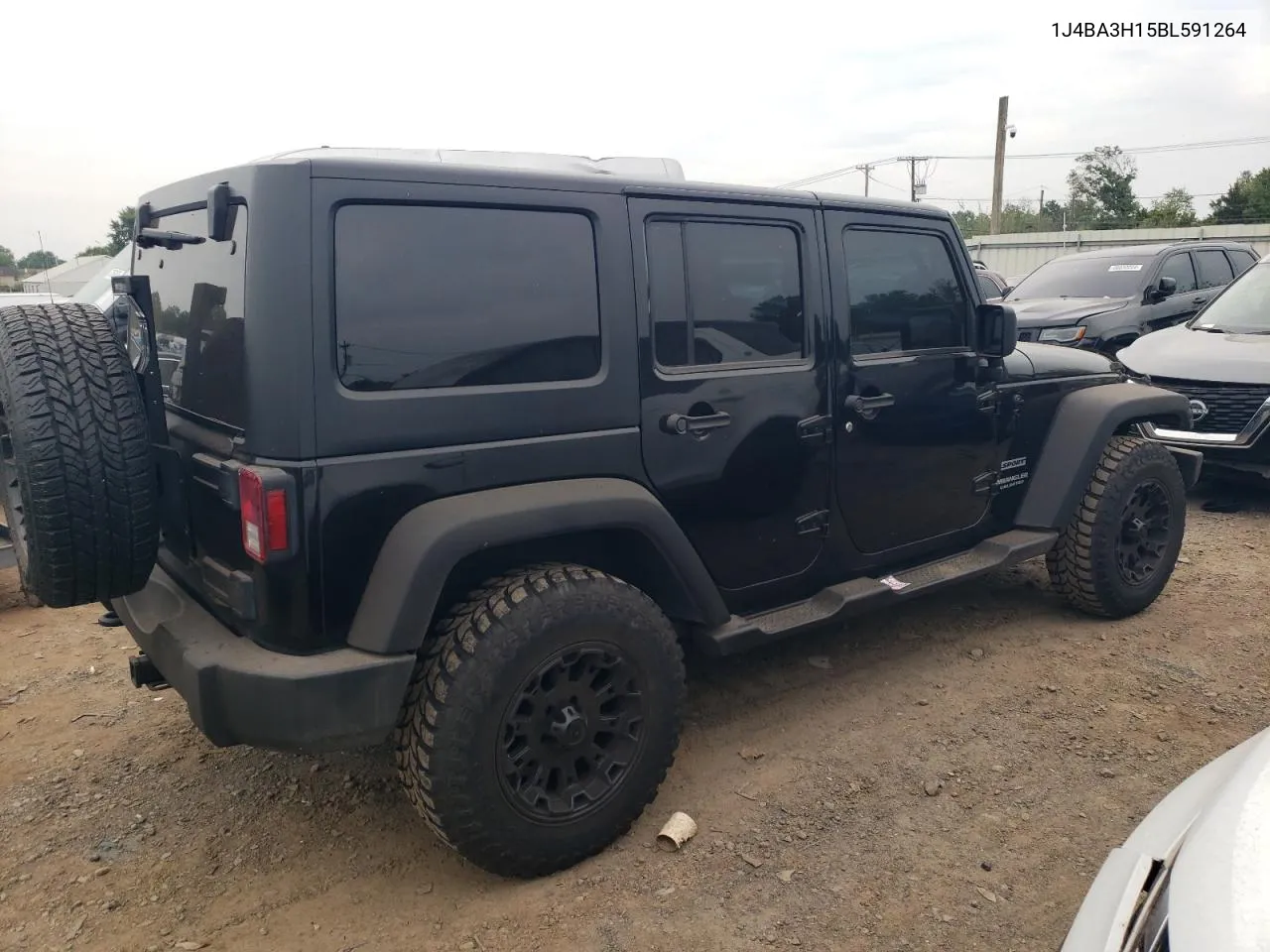 2011 Jeep Wrangler Unlimited Sport VIN: 1J4BA3H15BL591264 Lot: 67467524