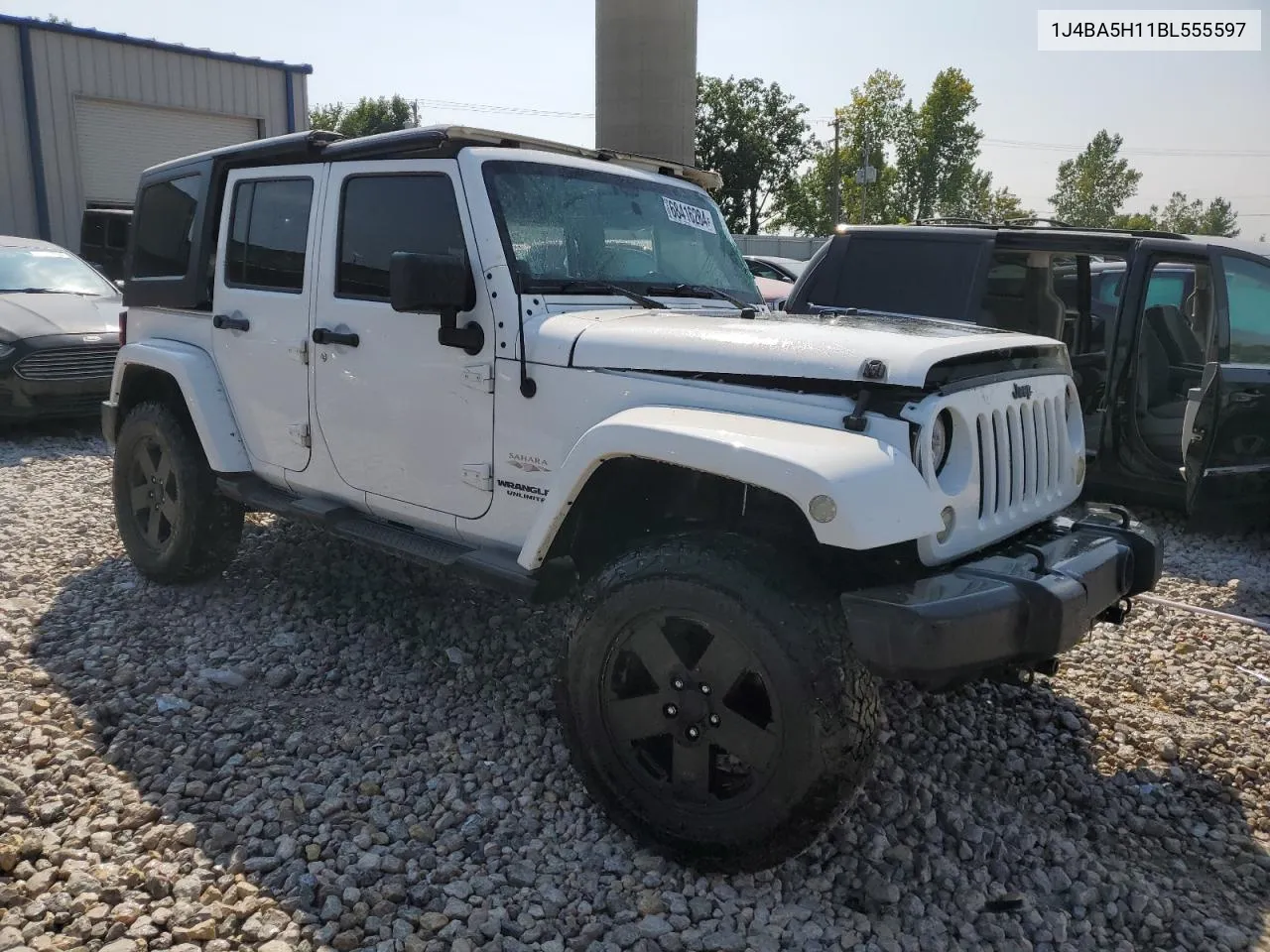 2011 Jeep Wrangler Unlimited Sahara VIN: 1J4BA5H11BL555597 Lot: 68416284