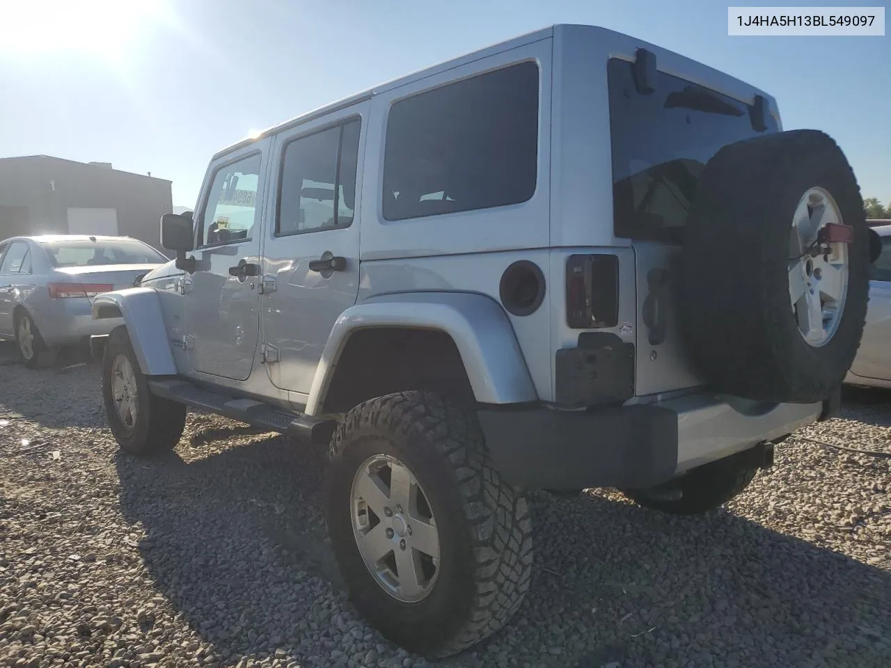 2011 Jeep Wrangler Unlimited Sahara VIN: 1J4HA5H13BL549097 Lot: 68943064