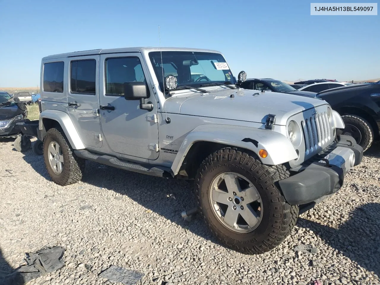 2011 Jeep Wrangler Unlimited Sahara VIN: 1J4HA5H13BL549097 Lot: 68943064