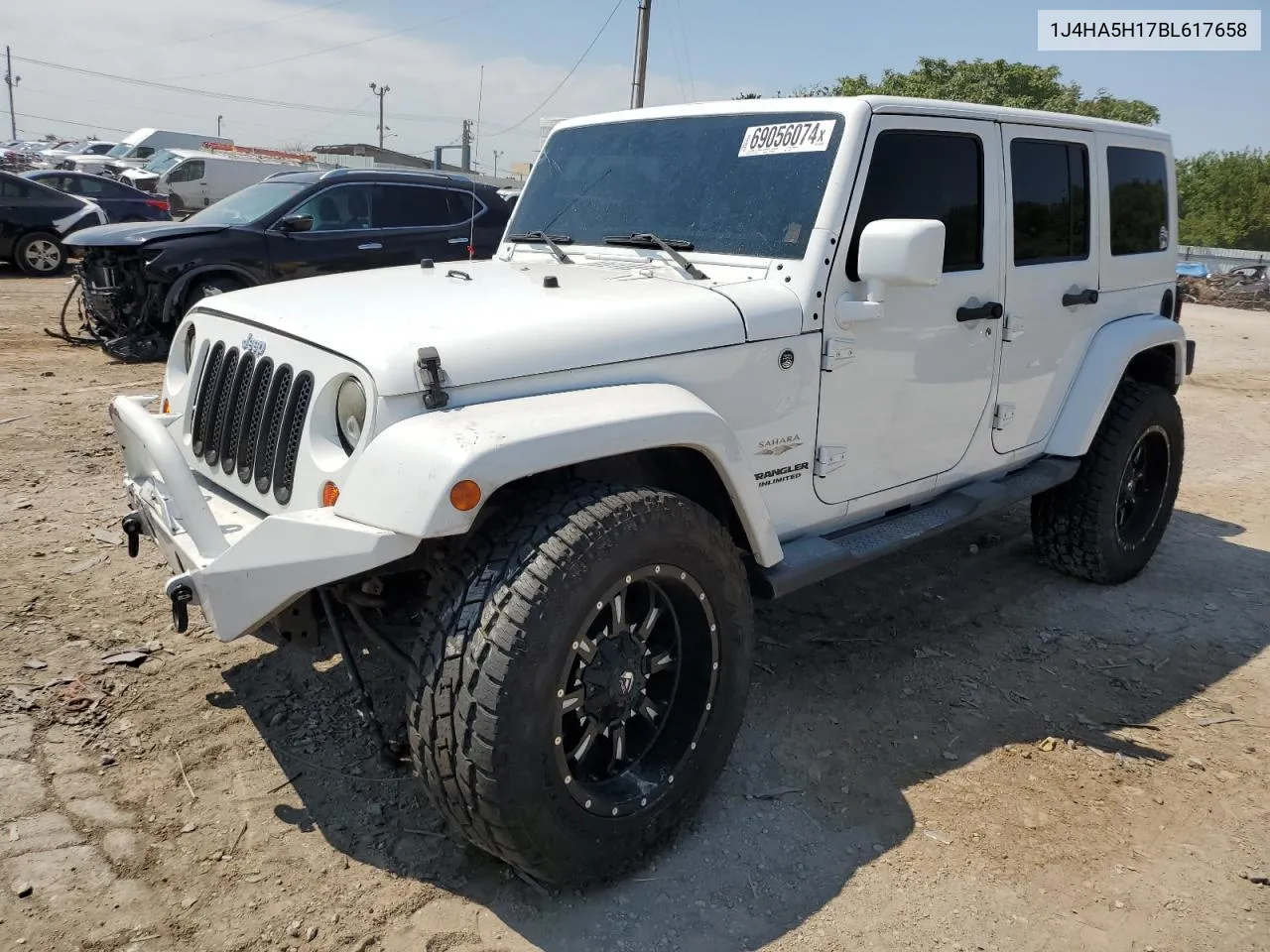 1J4HA5H17BL617658 2011 Jeep Wrangler Unlimited Sahara