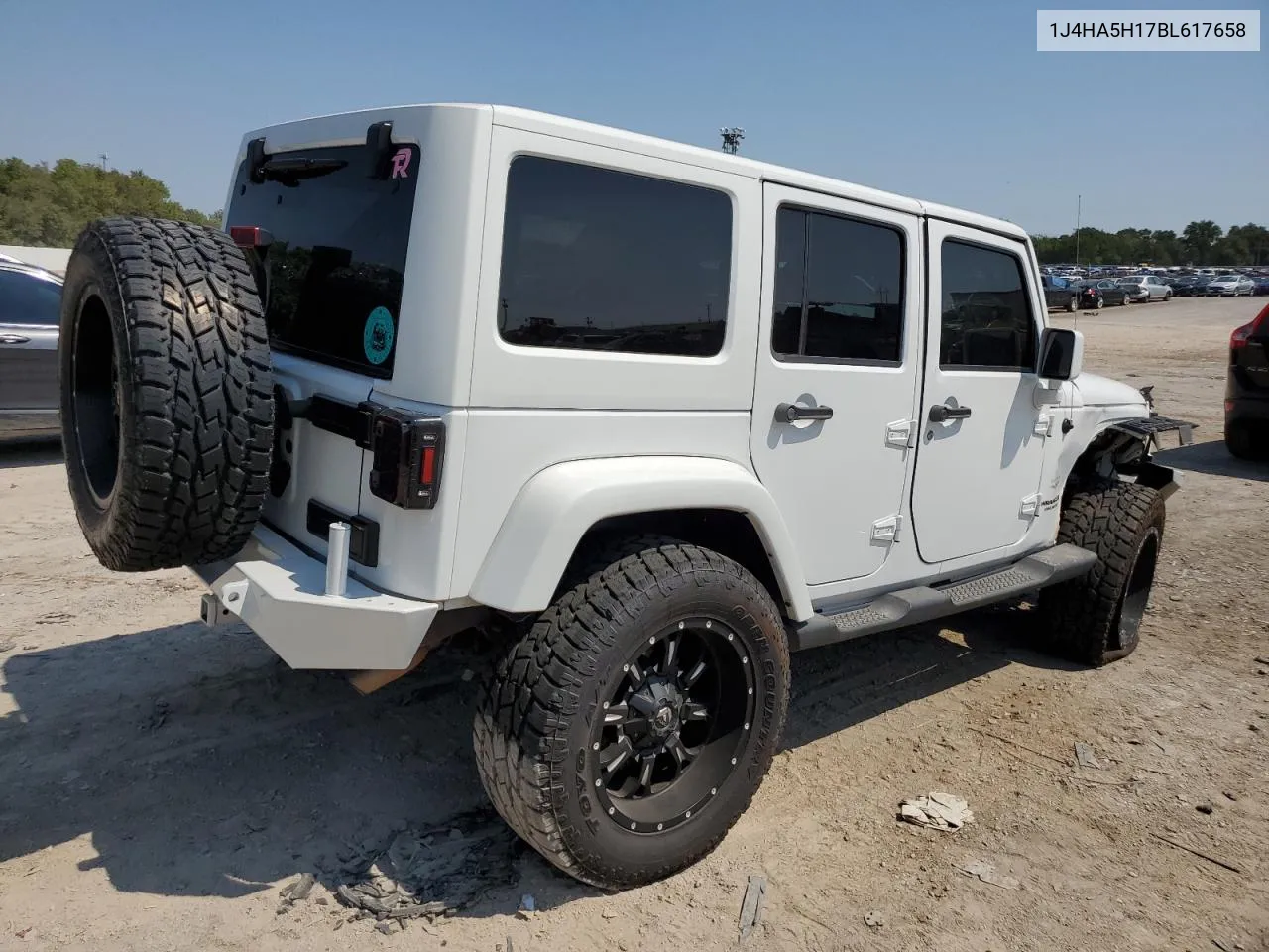 2011 Jeep Wrangler Unlimited Sahara VIN: 1J4HA5H17BL617658 Lot: 69056074