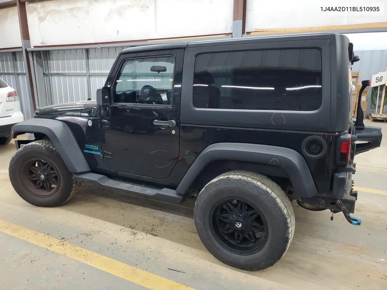 2011 Jeep Wrangler Sport VIN: 1J4AA2D11BL510935 Lot: 70759634