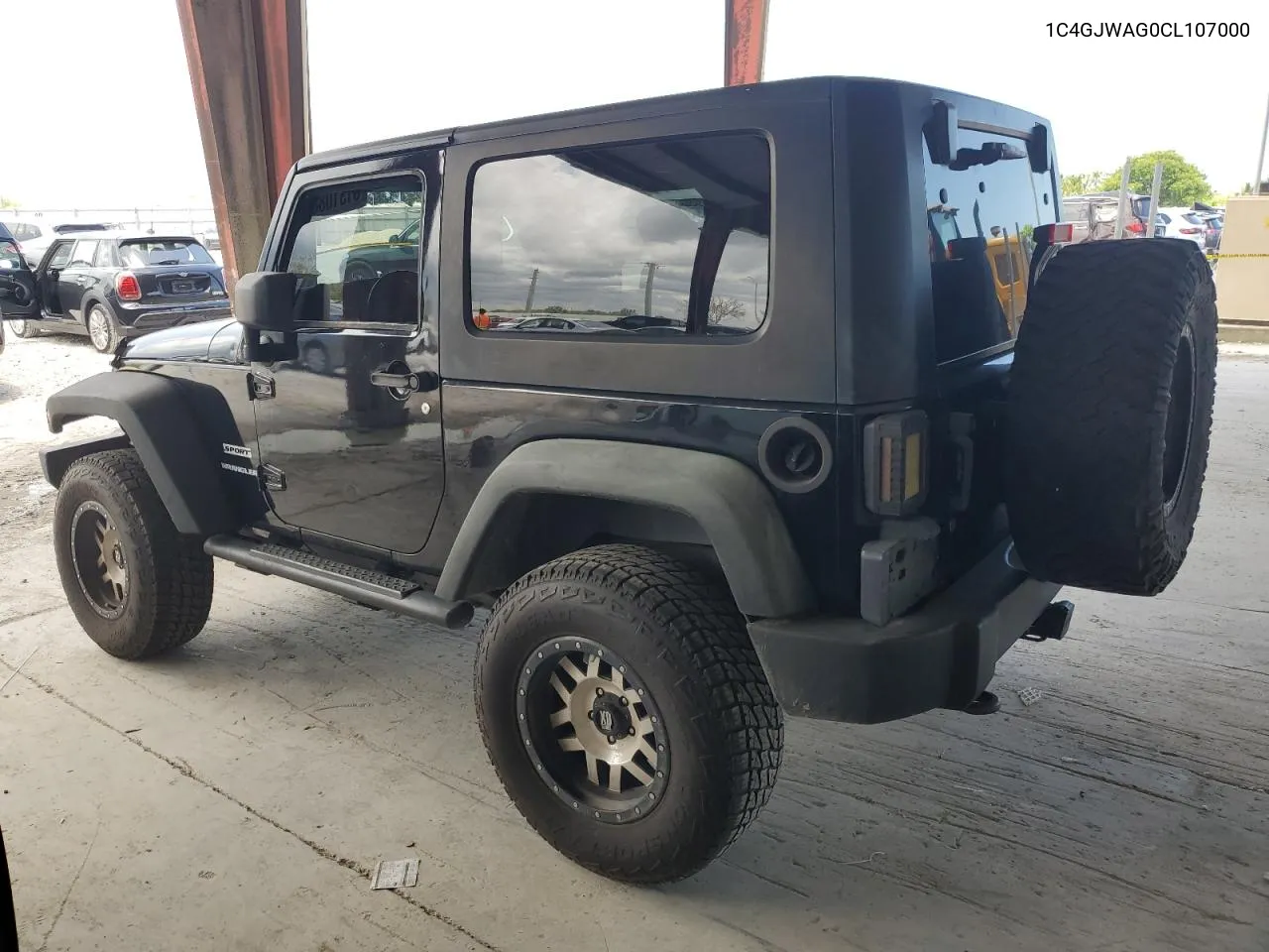 2012 Jeep Wrangler Sport VIN: 1C4GJWAG0CL107000 Lot: 61310884