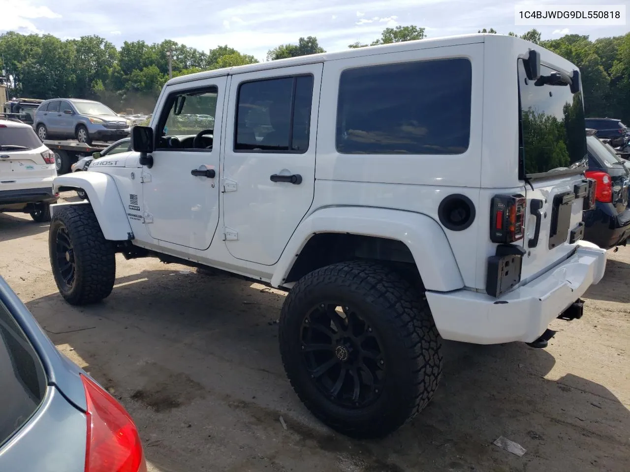 2013 Jeep Wrangler Unlimited Sport VIN: 1C4BJWDG9DL550818 Lot: 61314264