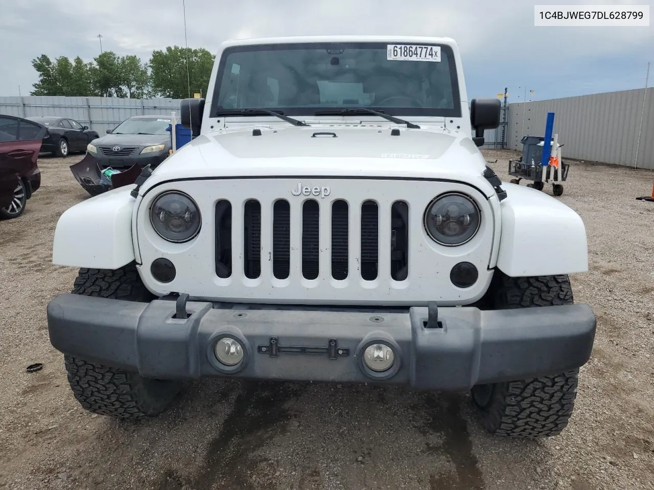 2013 Jeep Wrangler Unlimited Sahara VIN: 1C4BJWEG7DL628799 Lot: 61864774