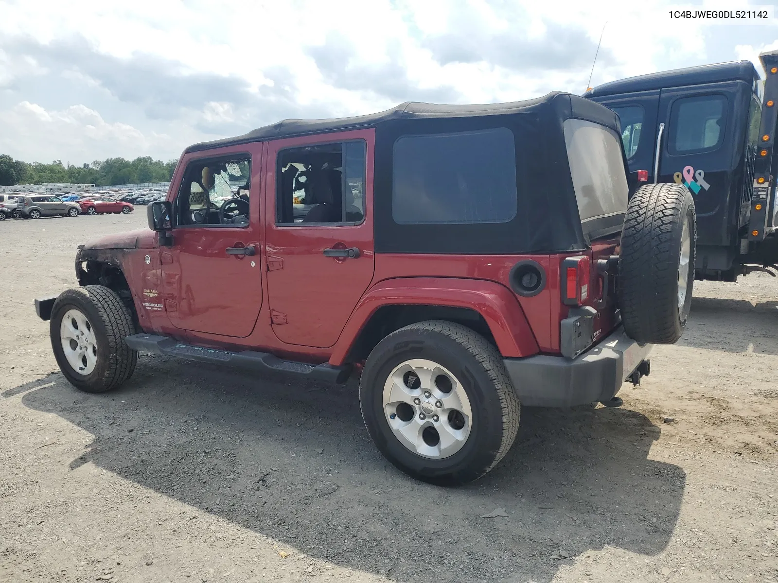 1C4BJWEG0DL521142 2013 Jeep Wrangler Unlimited Sahara