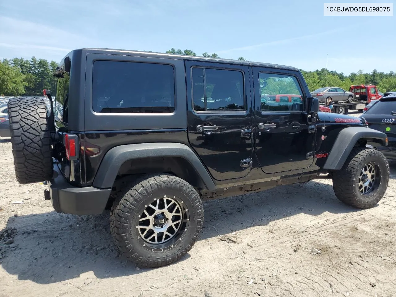 2013 Jeep Wrangler Unlimited Sport VIN: 1C4BJWDG5DL698075 Lot: 63422874