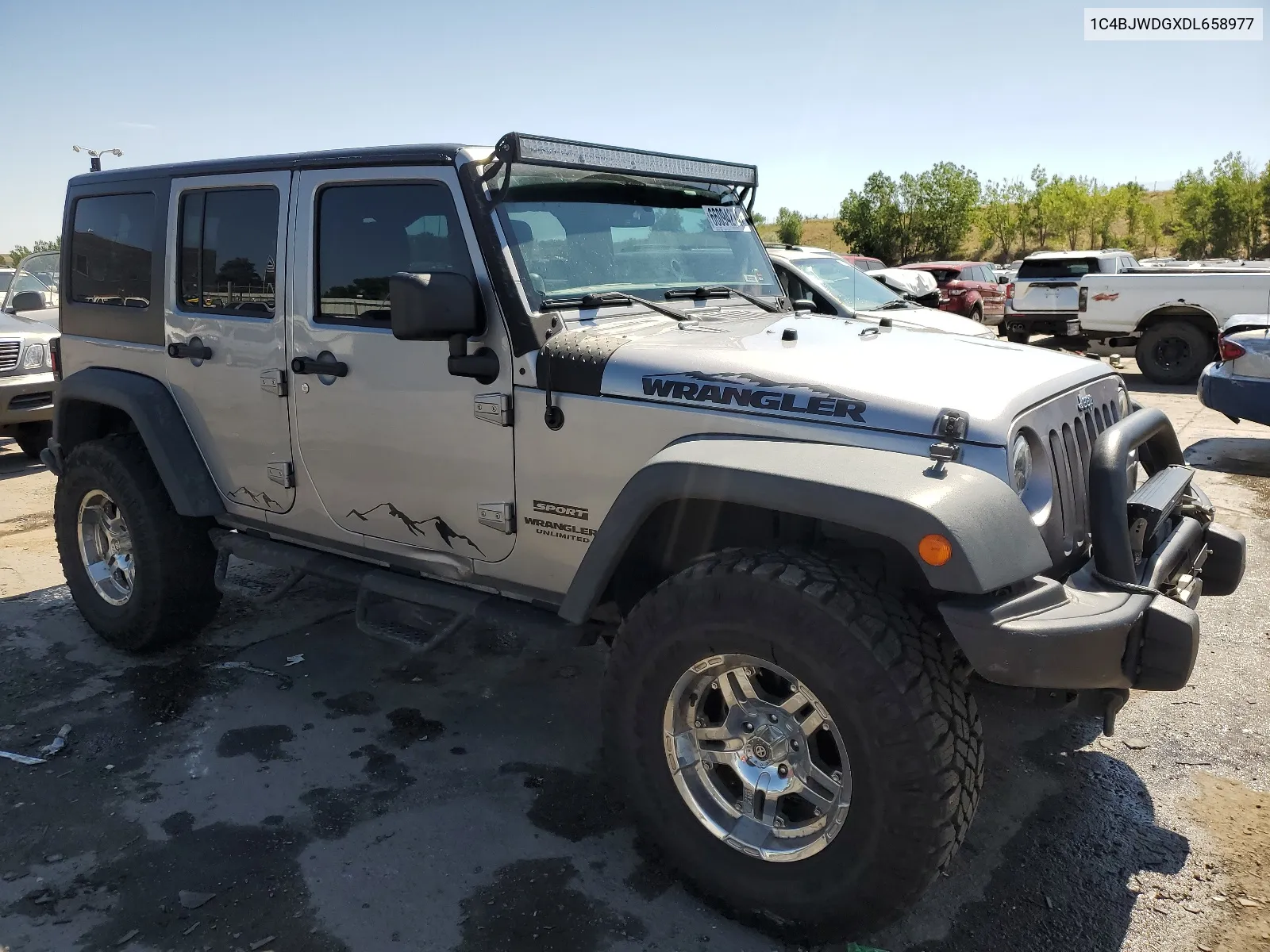 1C4BJWDGXDL658977 2013 Jeep Wrangler Unlimited Sport