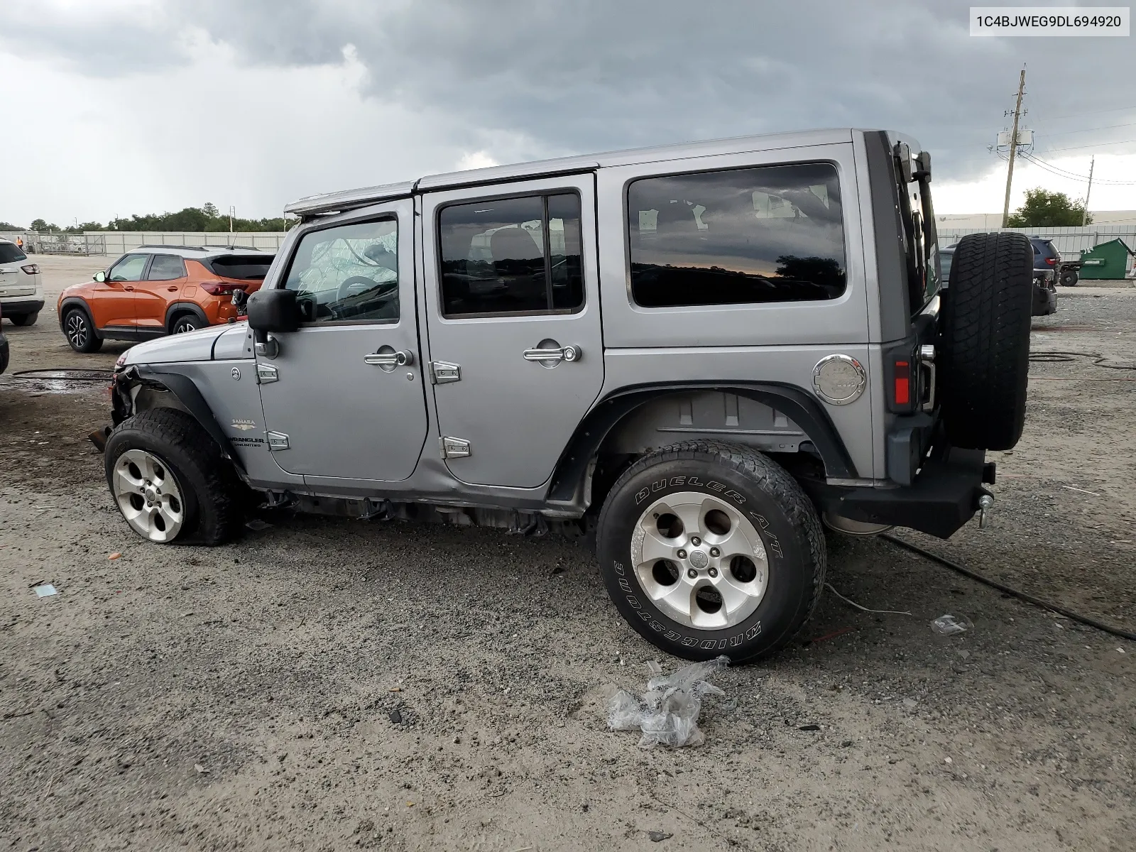 2013 Jeep Wrangler Unlimited Sahara VIN: 1C4BJWEG9DL694920 Lot: 66958244