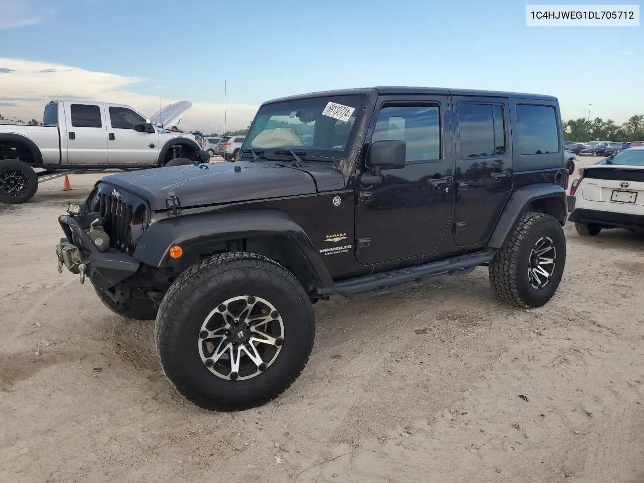 1C4HJWEG1DL705712 2013 Jeep Wrangler Unlimited Sahara