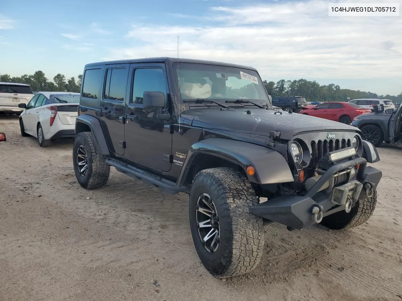 2013 Jeep Wrangler Unlimited Sahara VIN: 1C4HJWEG1DL705712 Lot: 69132724