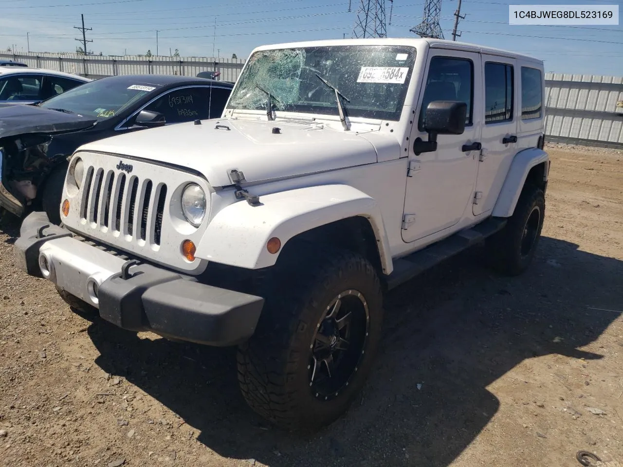 2013 Jeep Wrangler Unlimited Sahara VIN: 1C4BJWEG8DL523169 Lot: 69226584