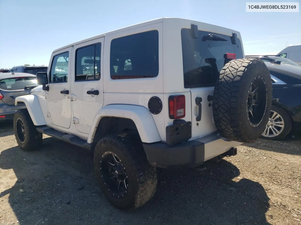 2013 Jeep Wrangler Unlimited Sahara VIN: 1C4BJWEG8DL523169 Lot: 69226584