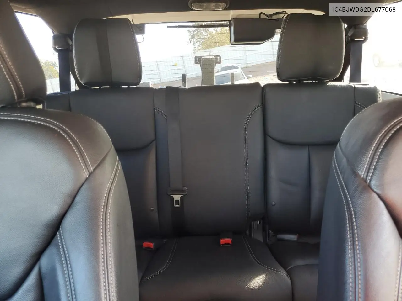 1C4BJWDG2DL677068 2013 Jeep Wrangler Unlimited Sport