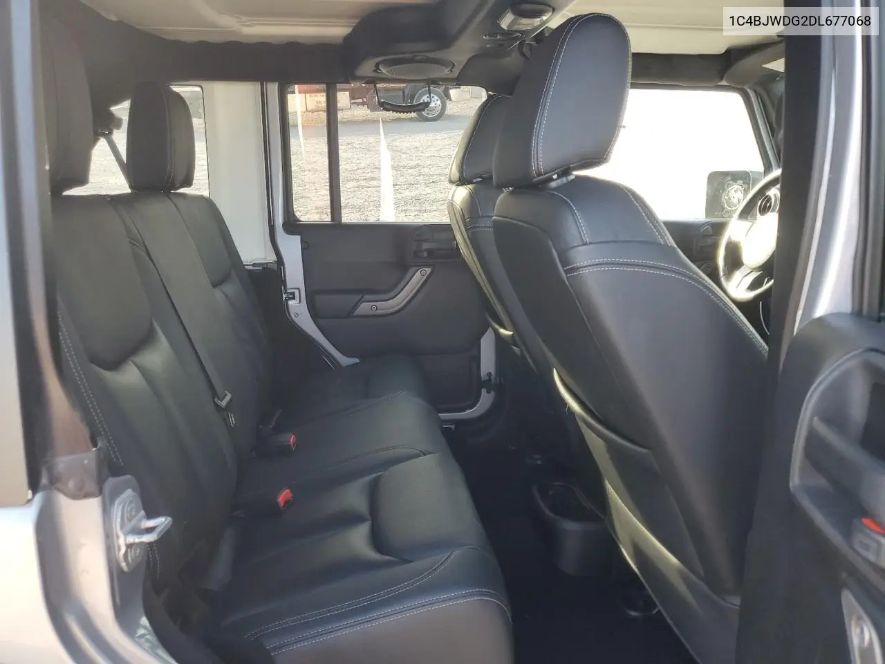 1C4BJWDG2DL677068 2013 Jeep Wrangler Unlimited Sport