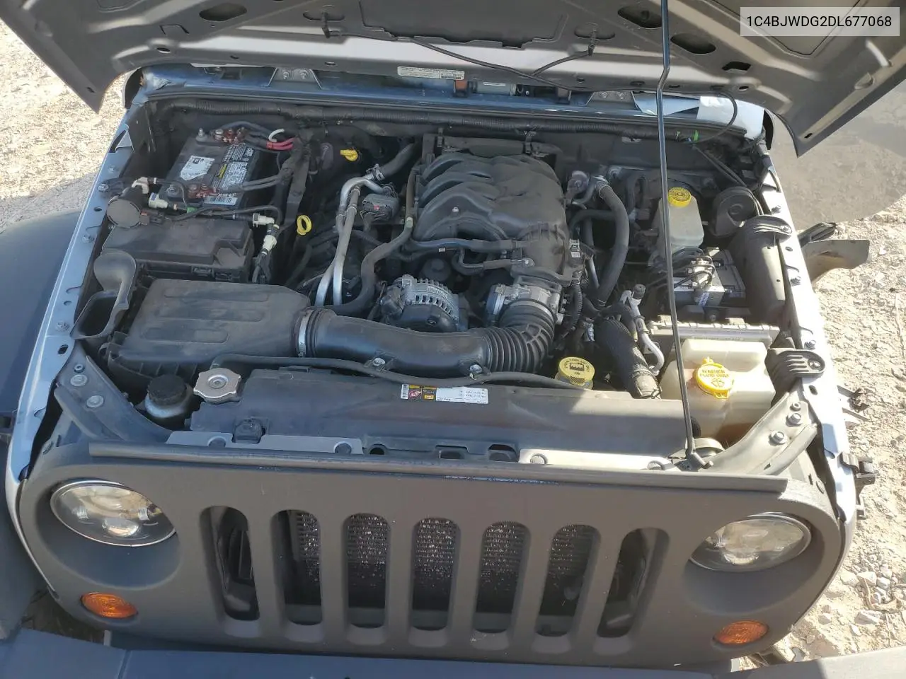 1C4BJWDG2DL677068 2013 Jeep Wrangler Unlimited Sport