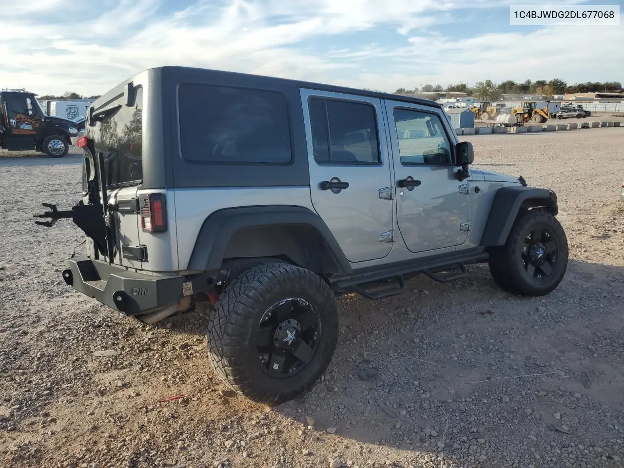 1C4BJWDG2DL677068 2013 Jeep Wrangler Unlimited Sport
