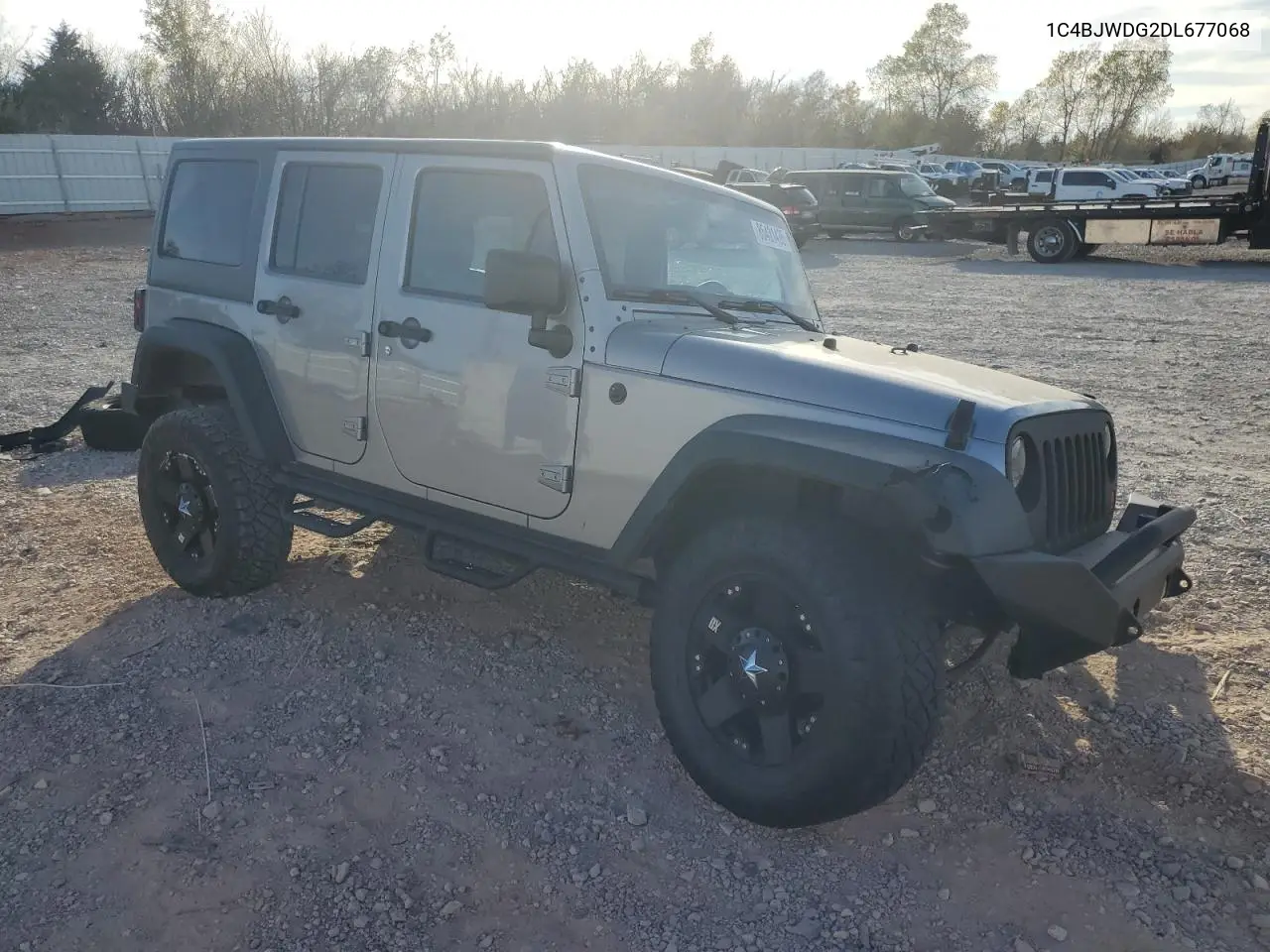 1C4BJWDG2DL677068 2013 Jeep Wrangler Unlimited Sport