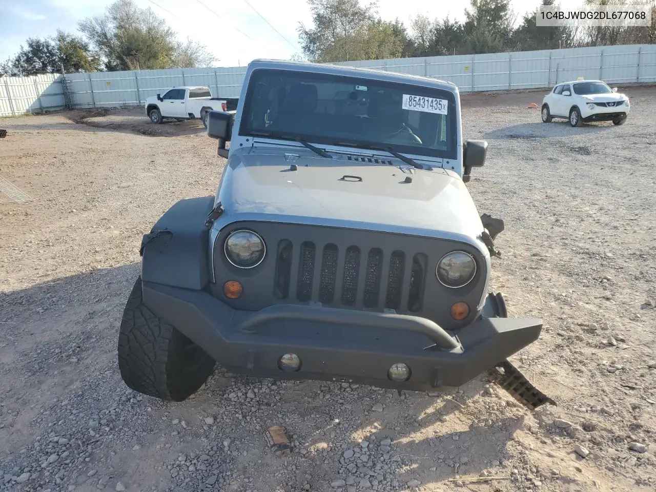 1C4BJWDG2DL677068 2013 Jeep Wrangler Unlimited Sport
