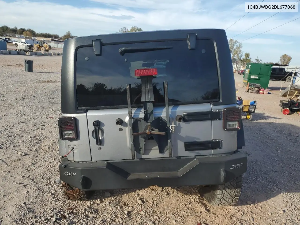1C4BJWDG2DL677068 2013 Jeep Wrangler Unlimited Sport