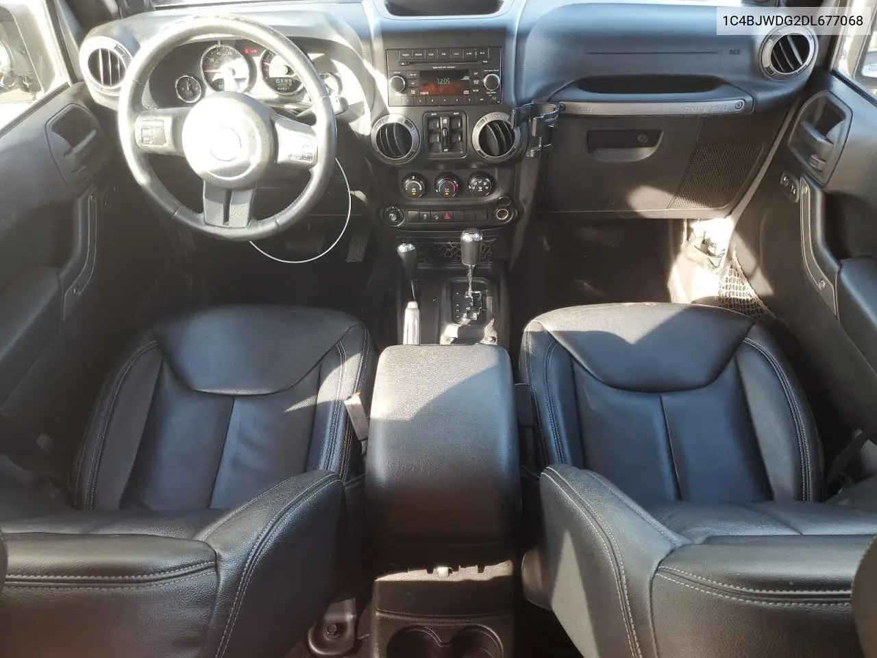 1C4BJWDG2DL677068 2013 Jeep Wrangler Unlimited Sport