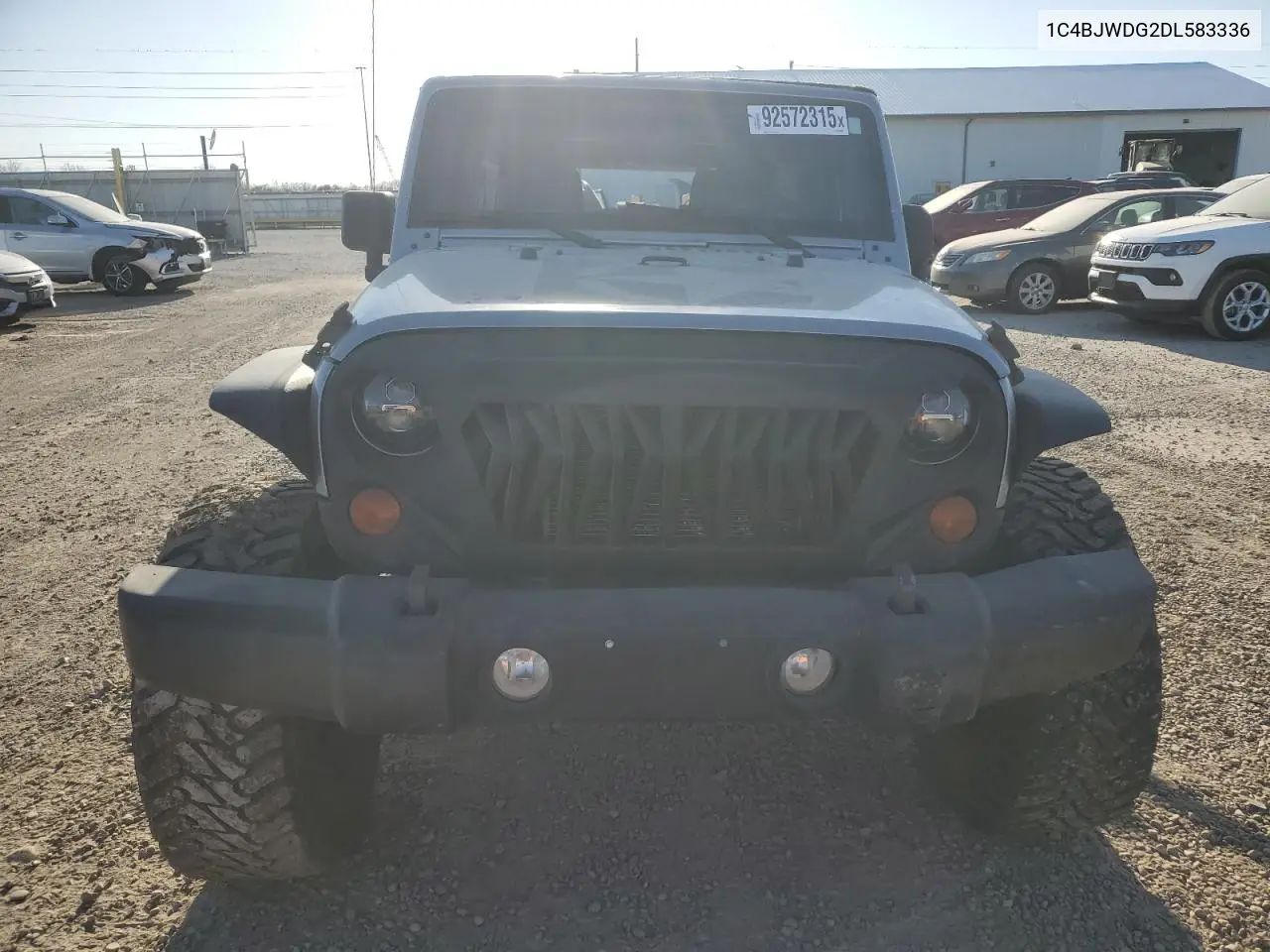 1C4BJWDG2DL583336 2013 Jeep Wrangler Unlimited Sport