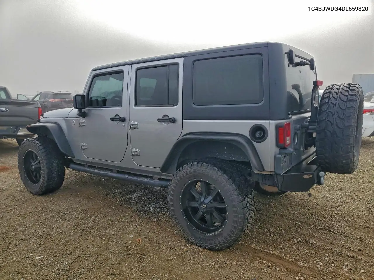 1C4BJWDG4DL659820 2013 Jeep Wrangler Unlimited Sport