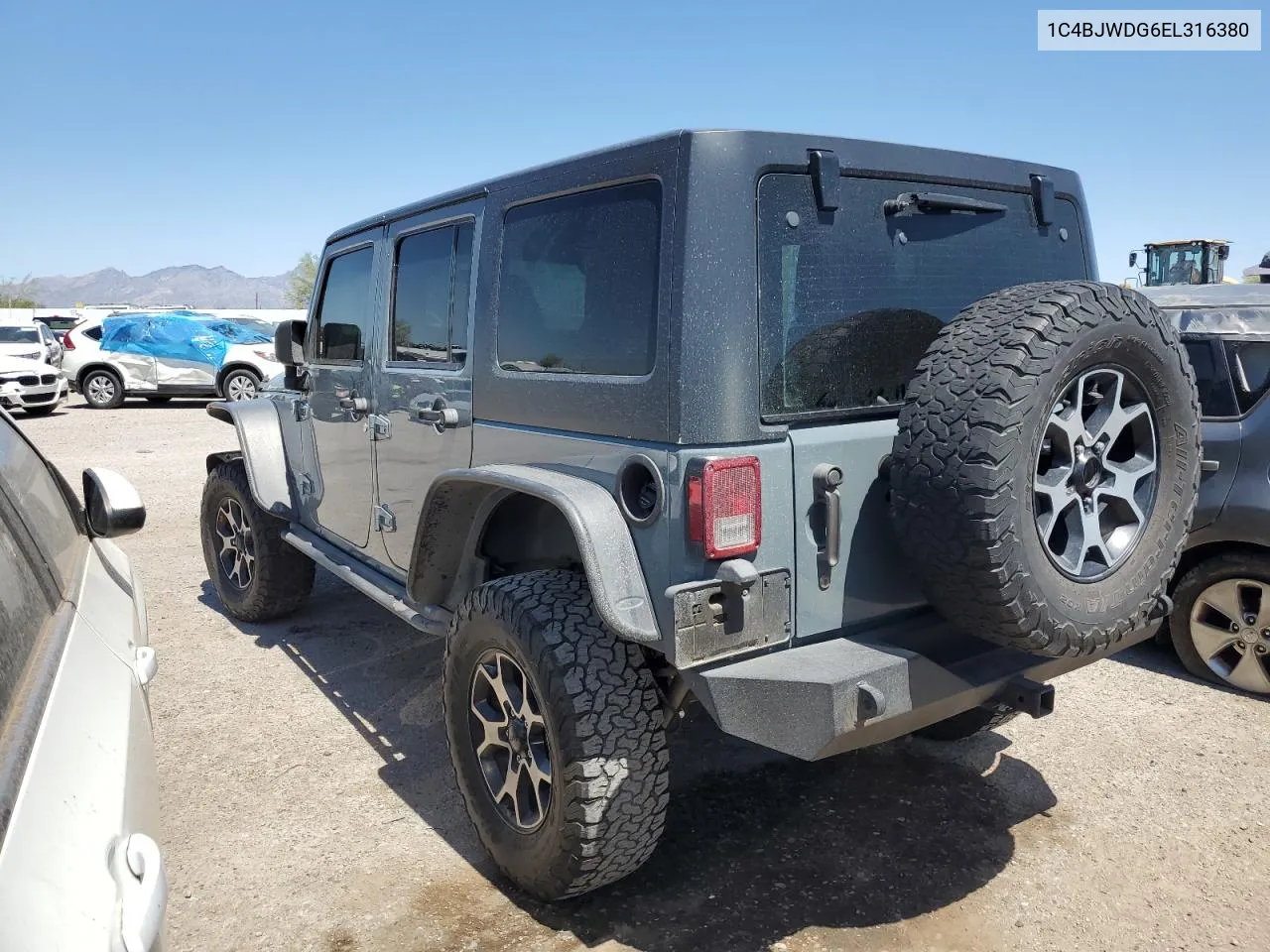 1C4BJWDG6EL316380 2014 Jeep Wrangler Unlimited Sport