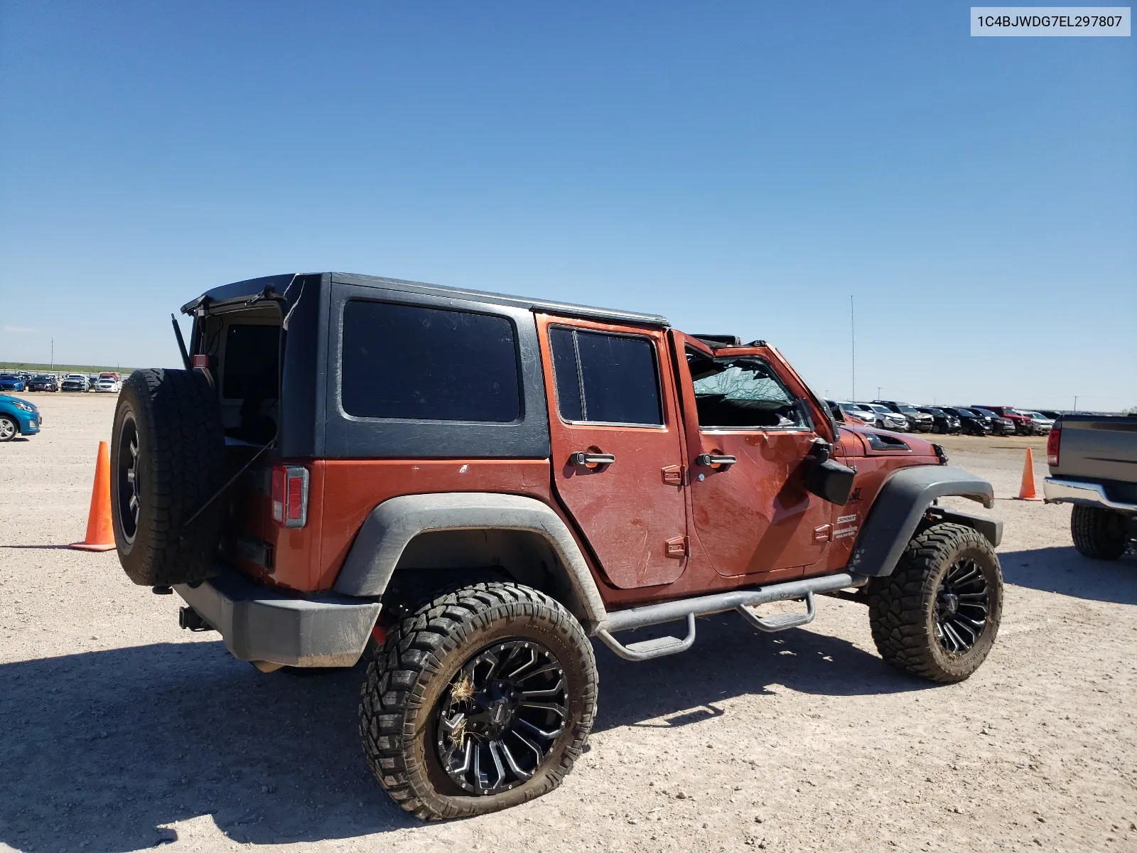 1C4BJWDG7EL297807 2014 Jeep Wrangler Unlimited Sport