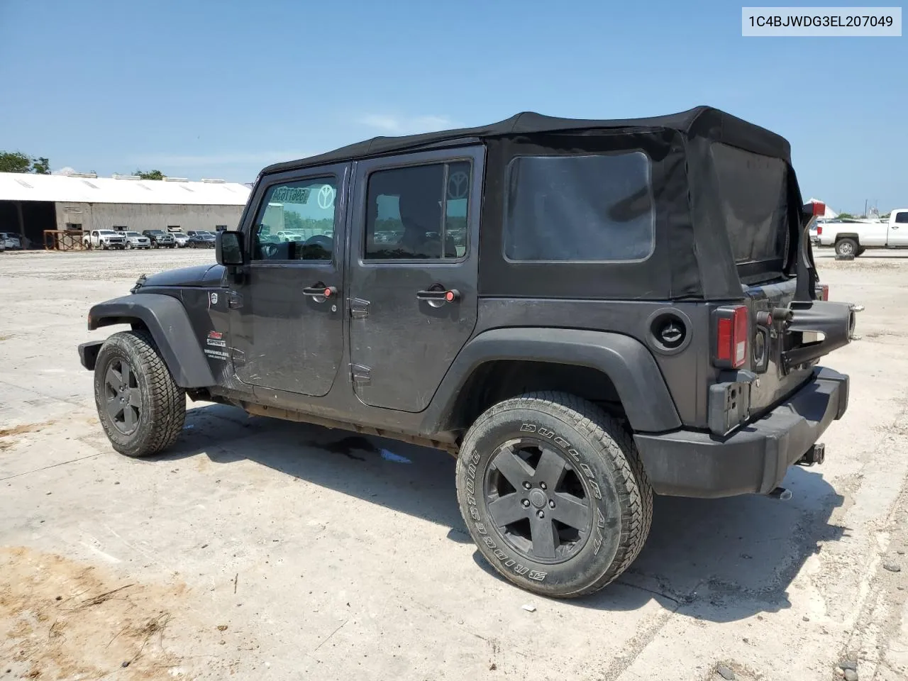 1C4BJWDG3EL207049 2014 Jeep Wrangler Unlimited Sport