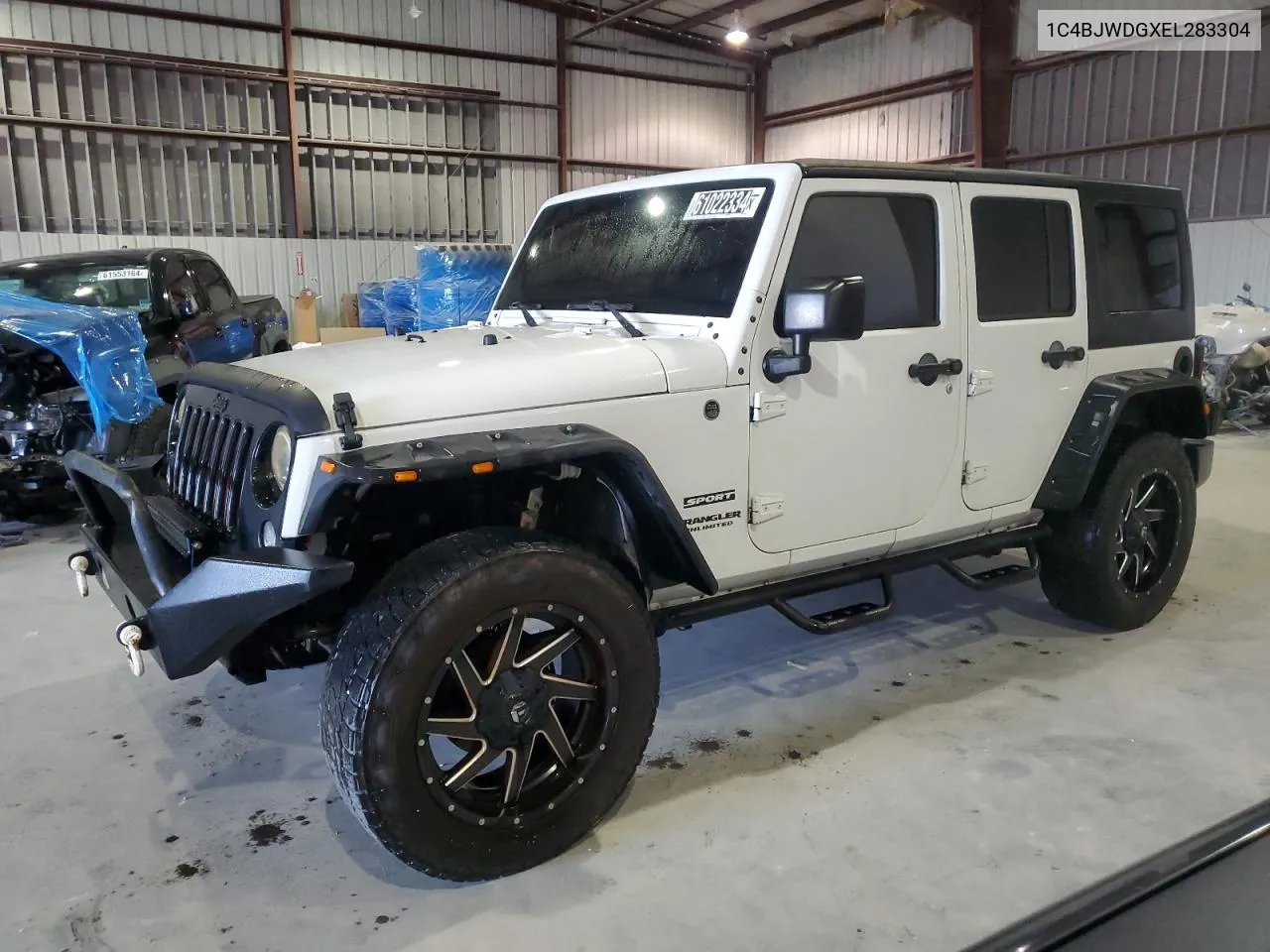 2014 Jeep Wrangler Unlimited Sport VIN: 1C4BJWDGXEL283304 Lot: 61022334