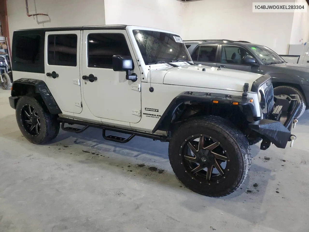 2014 Jeep Wrangler Unlimited Sport VIN: 1C4BJWDGXEL283304 Lot: 61022334